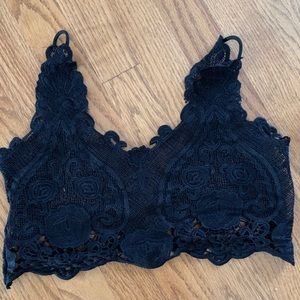 Never worn- black bathing suit